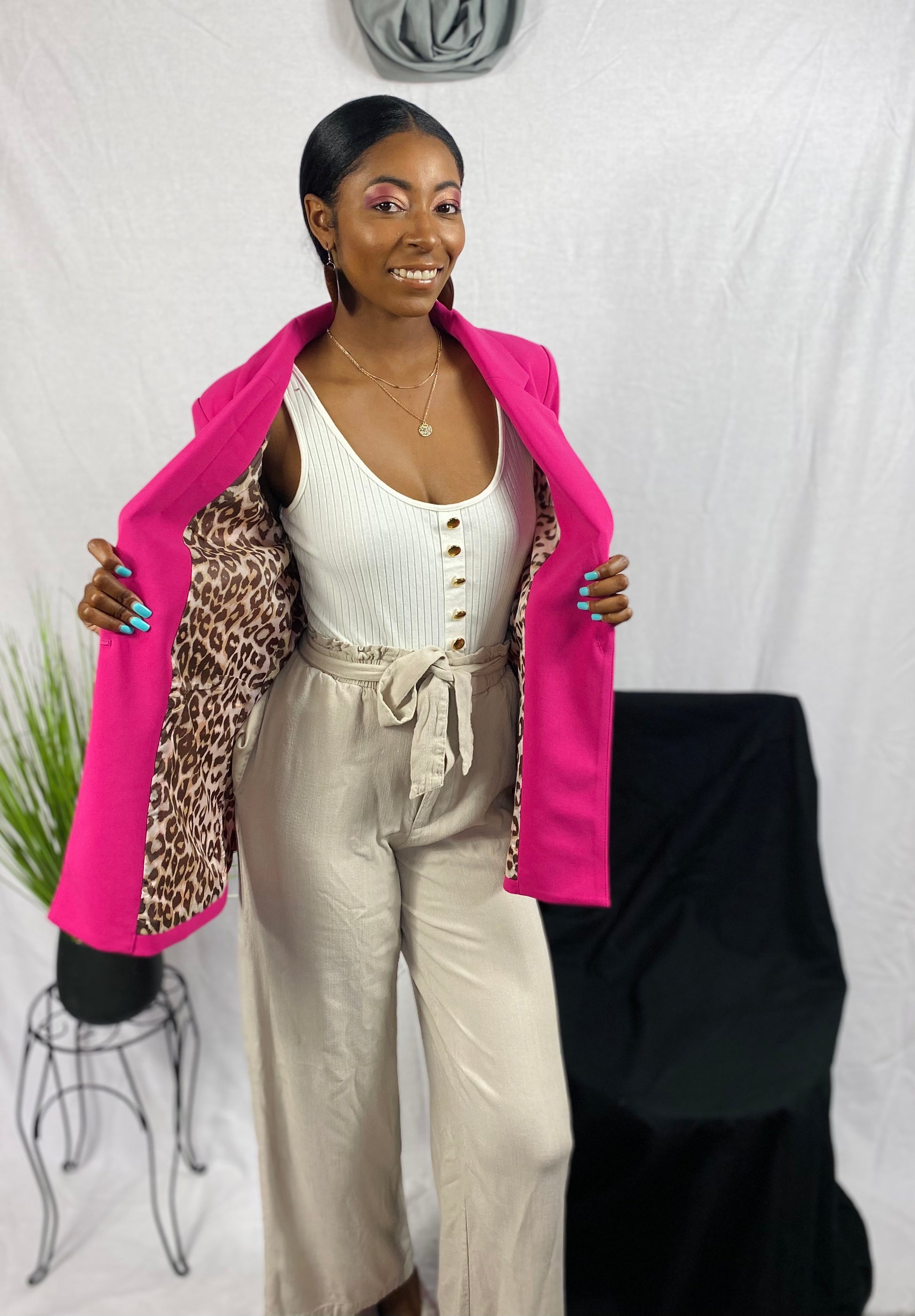 Hot pink blazer with leopard cuffs and interior. Not reversible. 