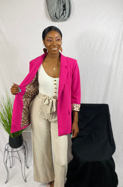 Plus size hot pink blazer with leopard cuffs and interior. Not reversible.