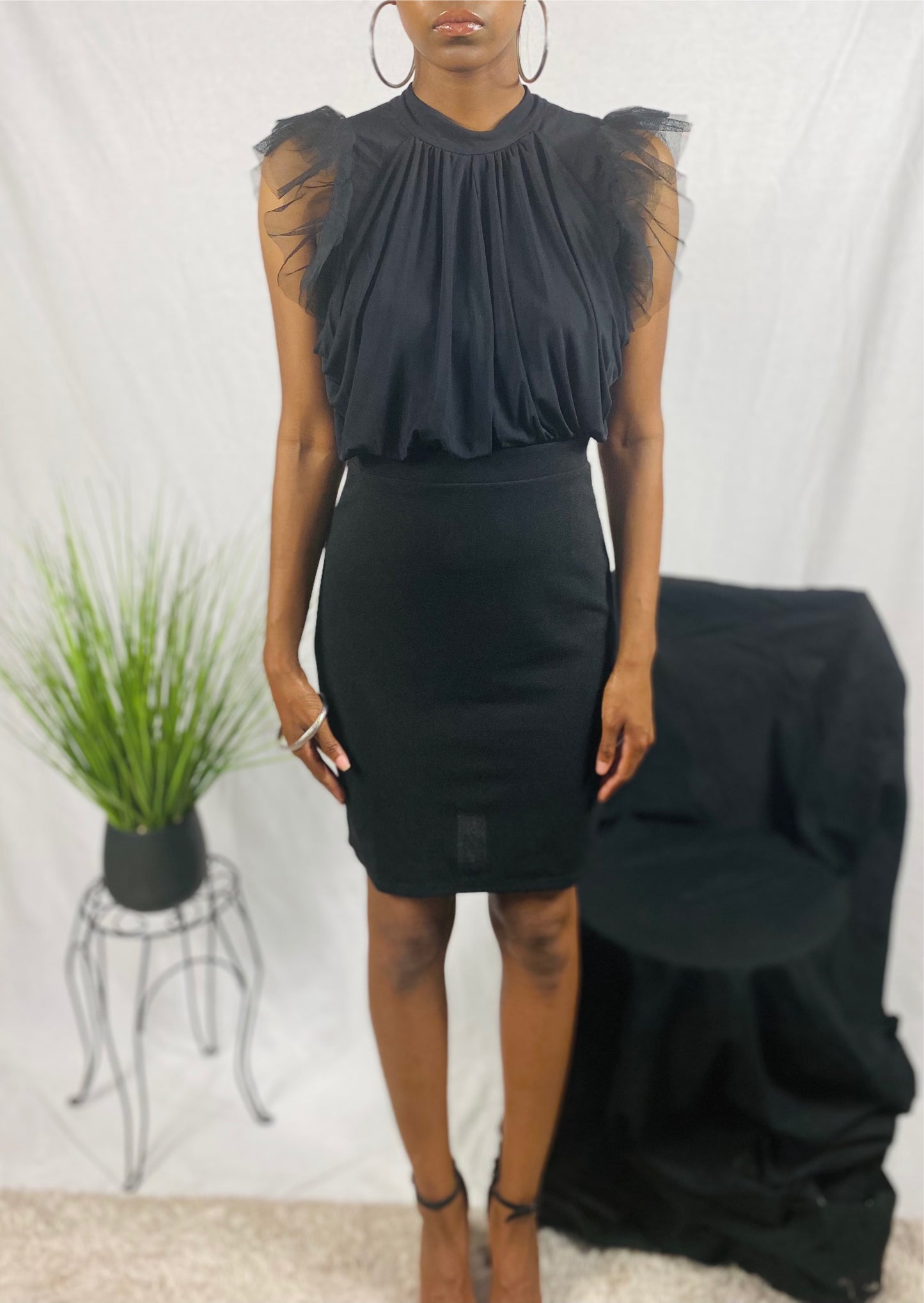 Black, ruffled shoulder, bodycon dress with circle cut out in back