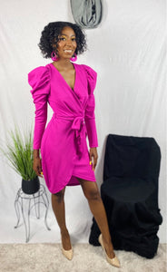 Pink mutton sleeve dress with waist tie and leg slit.